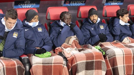 _78441374_manchester_city_players_cold_ap.jpg