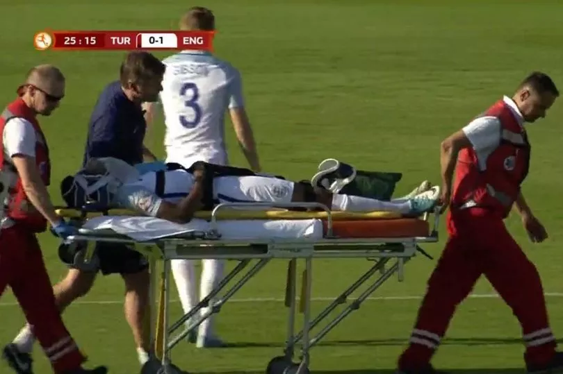 Tashan-Oakley-Boothe-is-taken-off-with-an-oxygen-mask-on-after-his-collision-during-the-England-U17.jpg