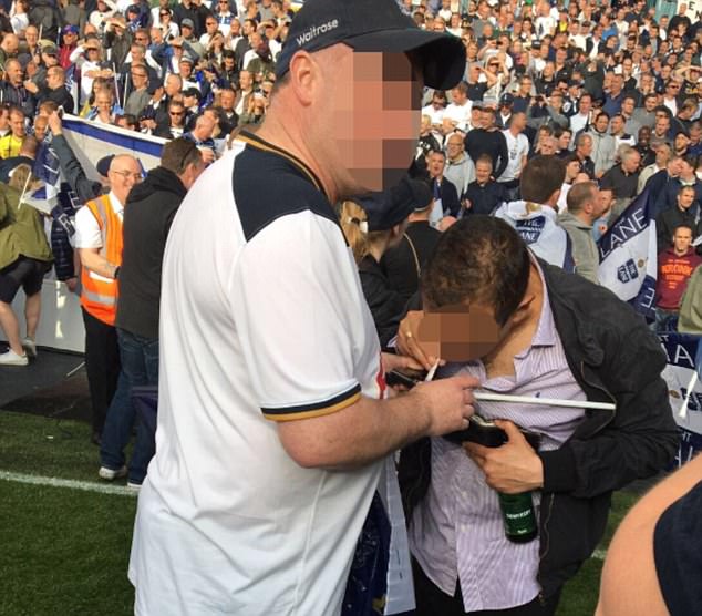 406812EC00000578-4513058-A_Tottenham_fan_was_photographed_appearing_to_sort_a_line_of_dru-m-11_1494977677473.jpg