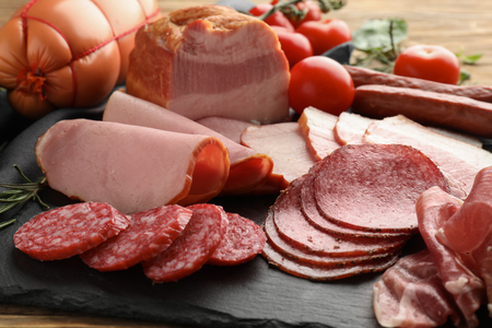 114622813-assortment-of-delicious-deli-meats-on-slate-plate.jpg
